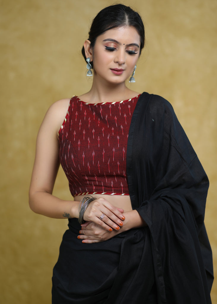 Elegant Maroon Ikaat Sleeveless Blouse with Golden Gota-Patti Detailin –  Sujatra