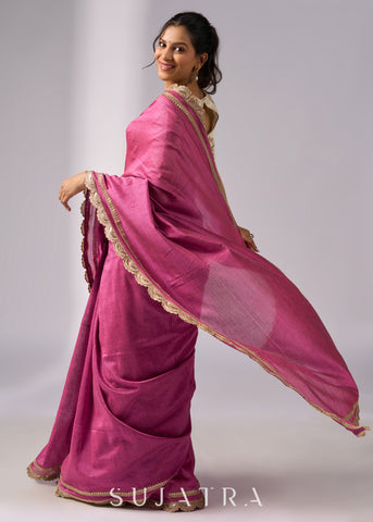 Rich pink cotton saree with golden zari and delicate design