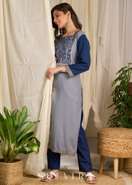 Graceful grey rayon kurti adorned with intricate block prints and artisanal floral patterns