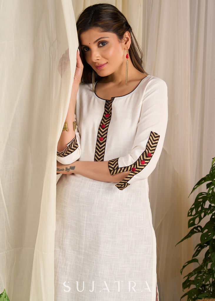 Graceful white cotton kurta with bold chevron block prints and intricate detailing