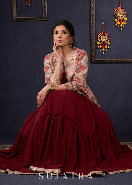 Classic Maroon Georgette Lehenga With Matching Blouse & Self-Embroidered Jacket .