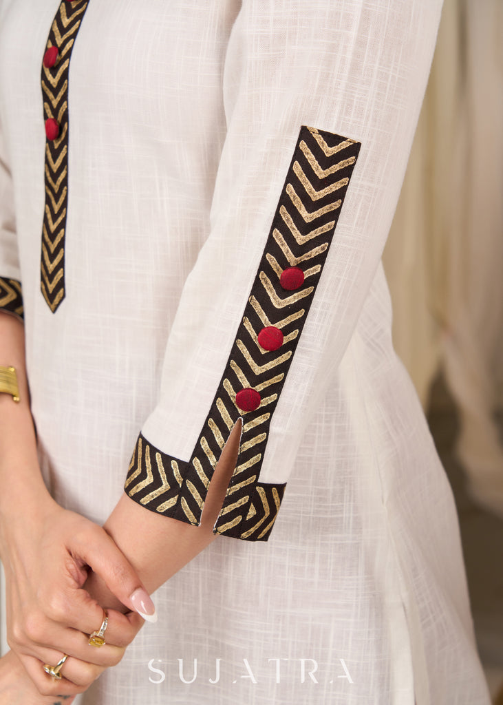 Graceful white cotton kurta with bold chevron block prints and intricate detailing