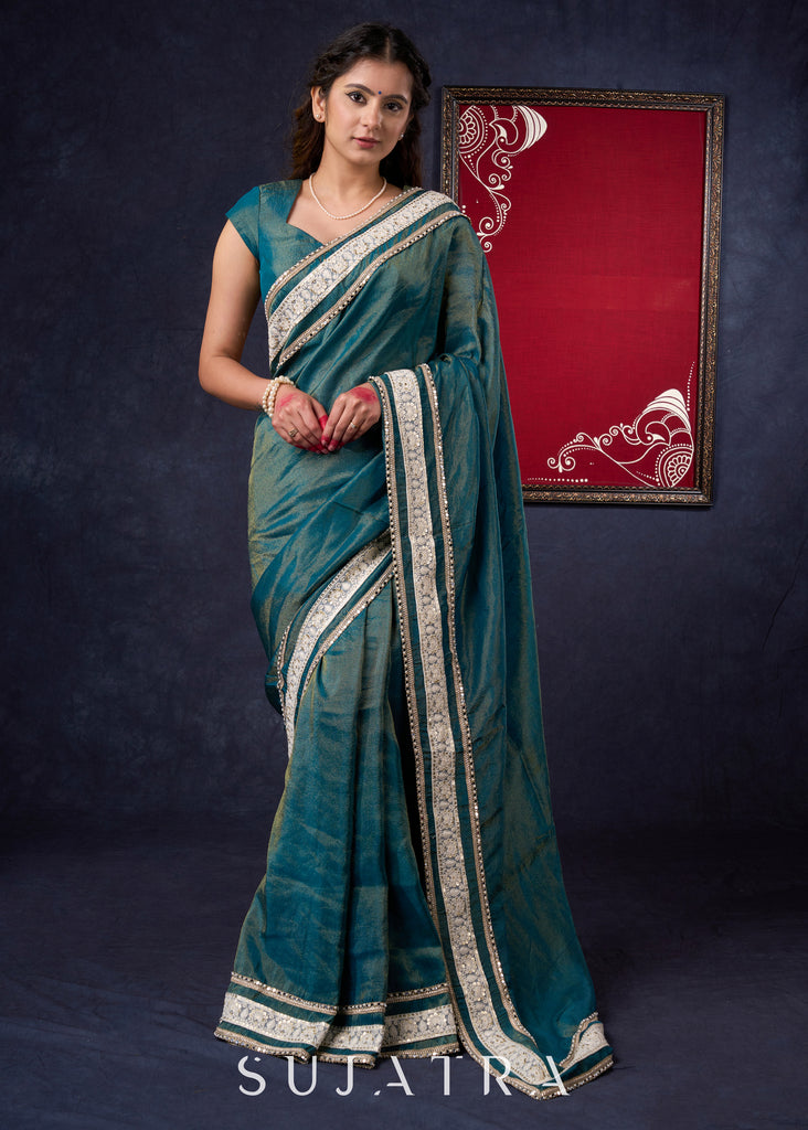 Beautiful Tissue saree Highlighted with Lace Detailing