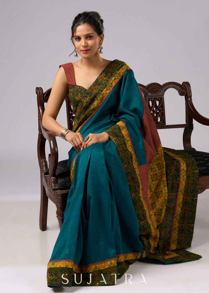 Exclusive green cotton saree with Ajrakh patchwork border