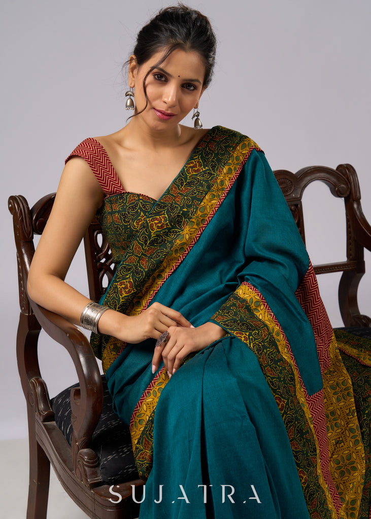 Exclusive green cotton saree with Ajrakh patchwork border