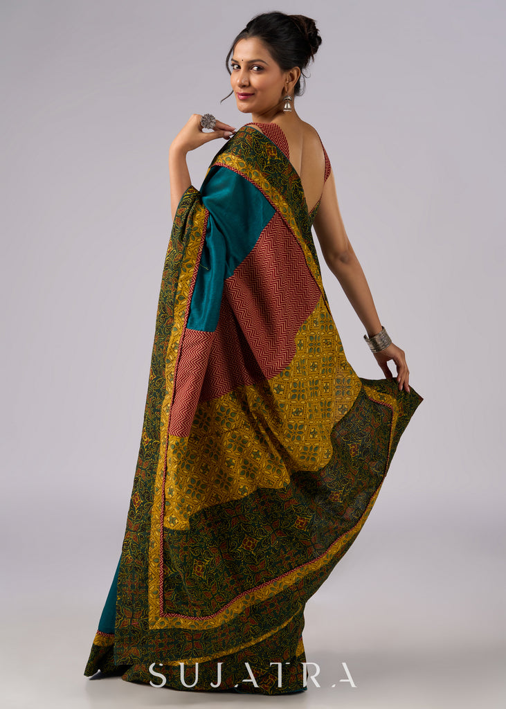 Exclusive green cotton saree with Ajrakh patchwork border