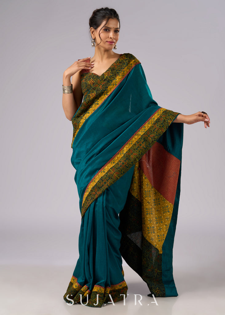 Exclusive green cotton saree with Ajrakh patchwork border