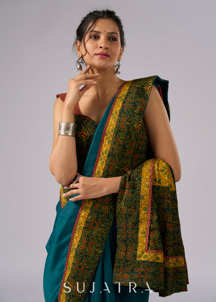 Exclusive green cotton saree with Ajrakh patchwork border