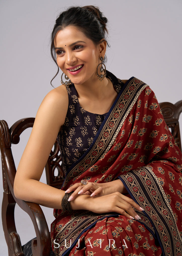 Exclusive brown printed combination saree with Ajrakh border