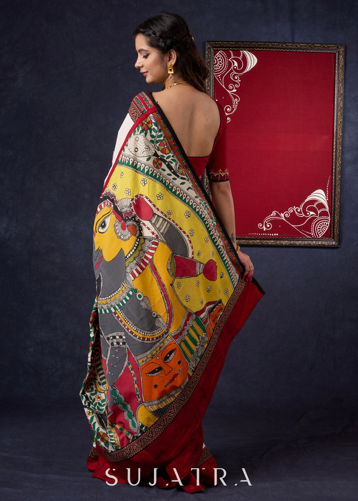 Beautiful Off-white saree with Hand-Painted Madhubani Pallu Highlighted with Ajrakh Border & Painted Floral Motifs