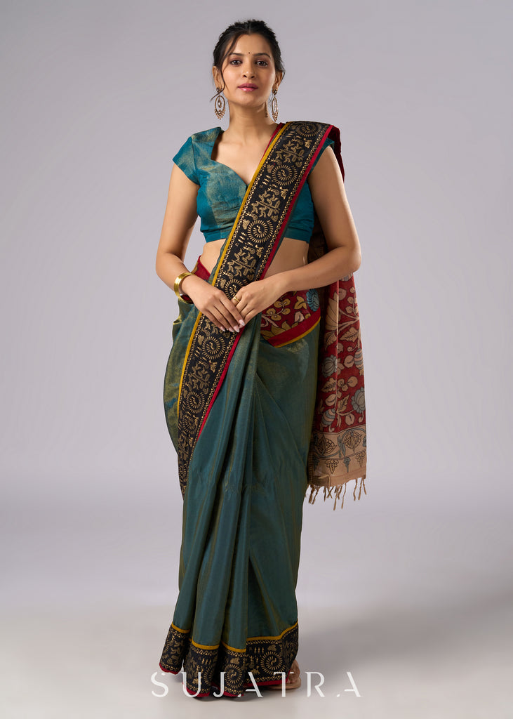 Elegant tissue saree with hand painted Kalamkari pallu