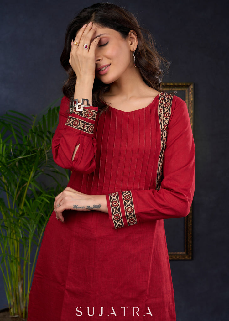 Maroon Cotton Tunic With Stylish Pin Tucks And Vibrant Ajrak Patterns.