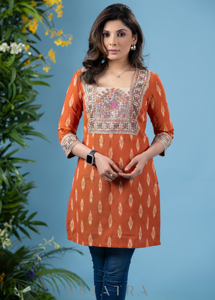 Graceful orange cotton ikat tunic with madhubani combination