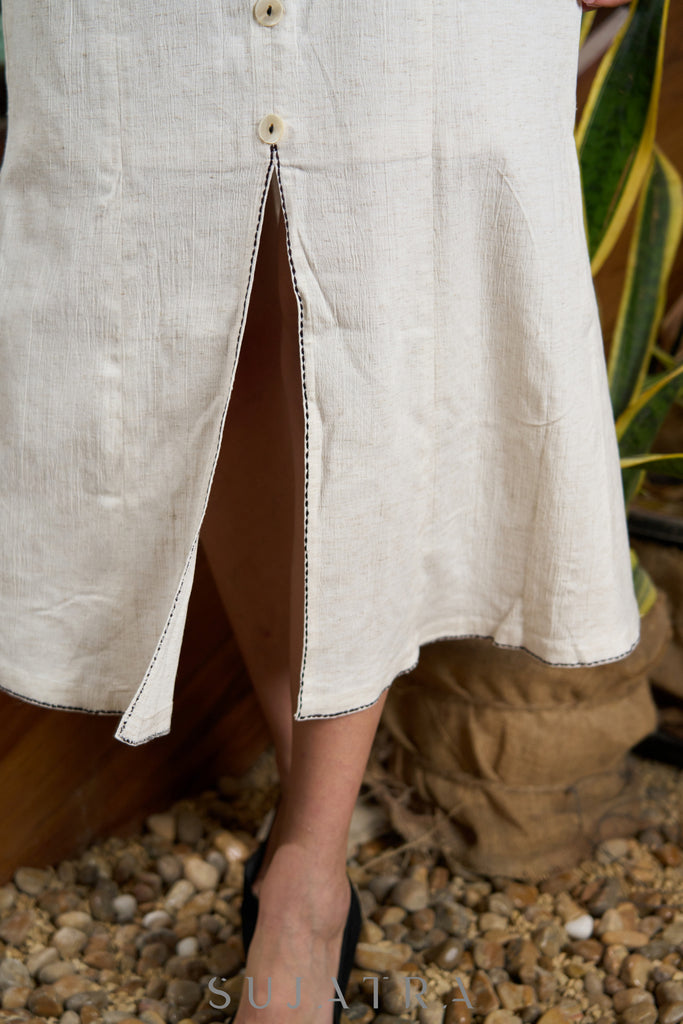 Classy off white cotton lycra sleeveless top highlihted with minimal embroidery - Matching long skirt Optional