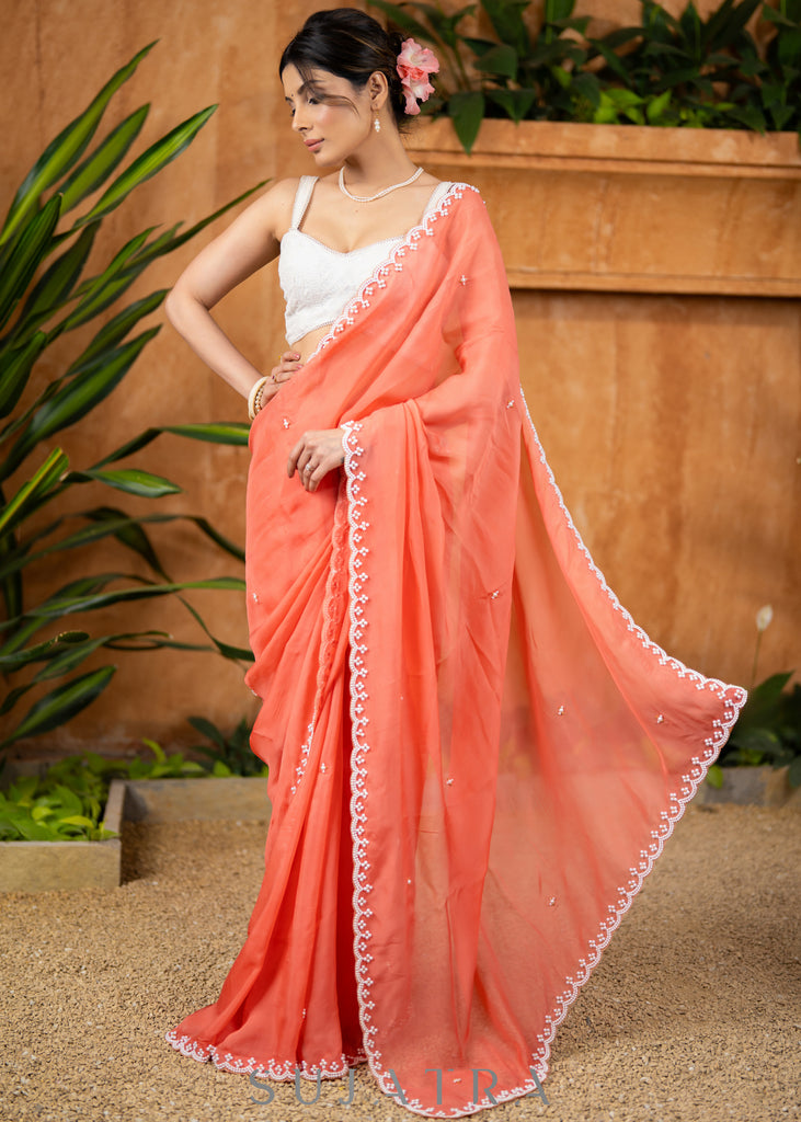 Buy HOUSE OF JAMOTI Alluring Peach Organza Saree with Unstitched Blouse  online