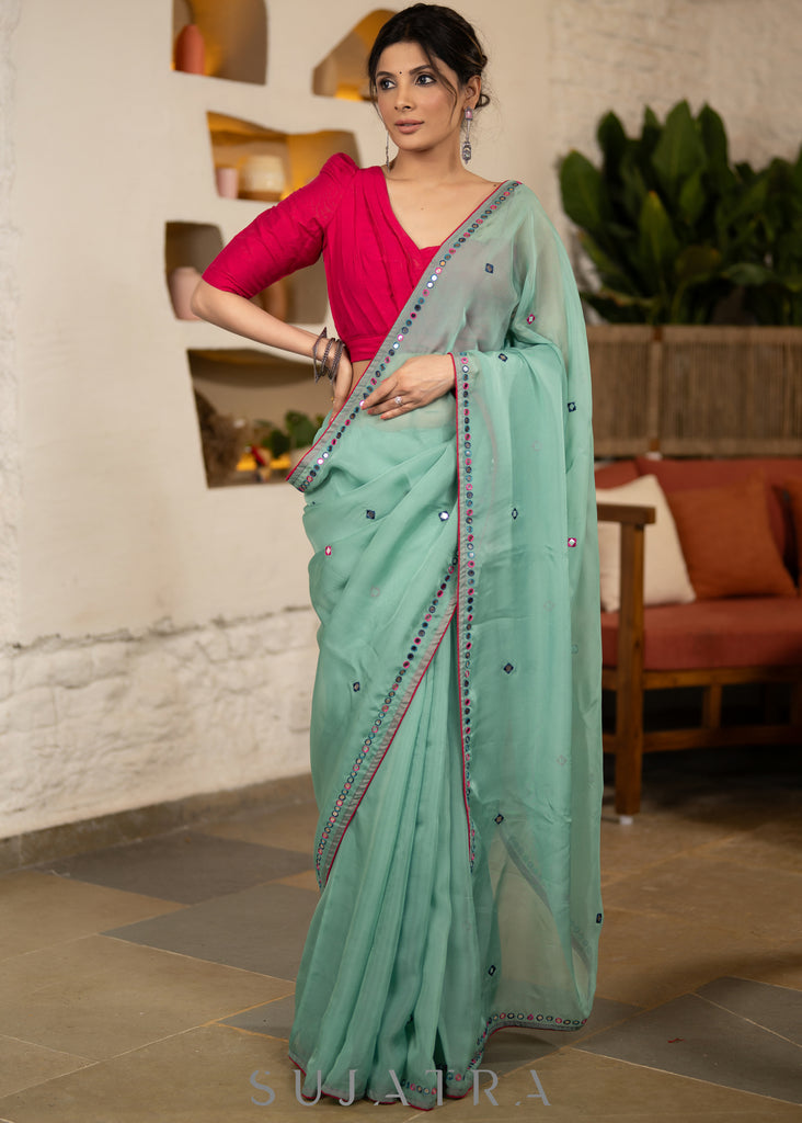 Designer Mint Green Organza Saree Highlighted With Overall Multicolour Mirror Embroidery