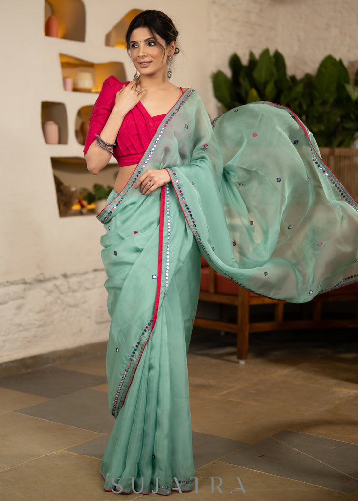 Designer Mint Green Organza Saree Highlighted With Overall Multicolour Mirror Embroidery