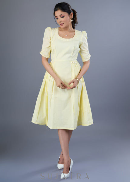 Dainty Lemon Yellow Cotton Mul Dress With Hand Embroidery On Neck & Sleeves