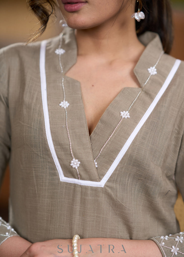 Elegant Beige cotton kurta with beadwork Pant optional