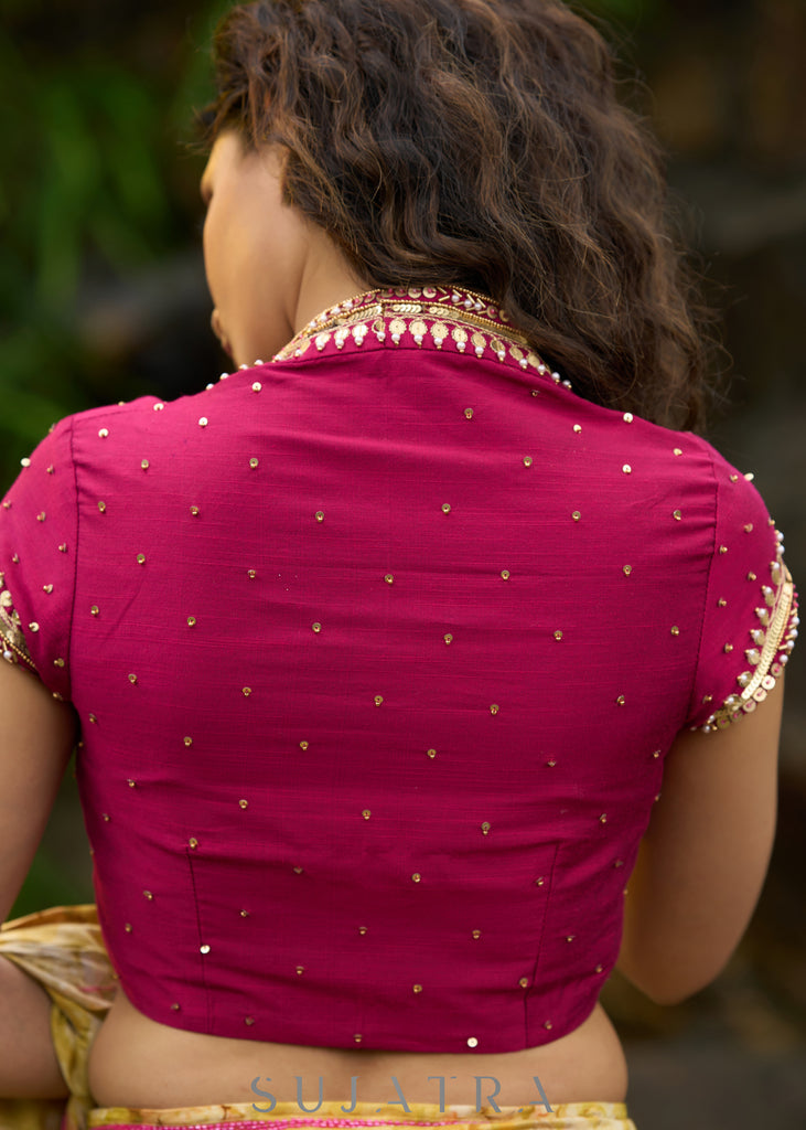 Graceful yellow floral print saree highlighted with overall beautiful hand embroidered mirrors