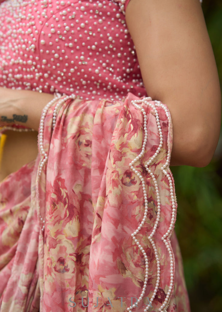 Gracious blush pink chanderi cap sleeved blouse with overall pearl embroidery