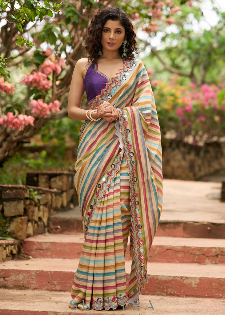 Stunning multicolor striped printed saree highlighted with elegant bold mirror work embroidery