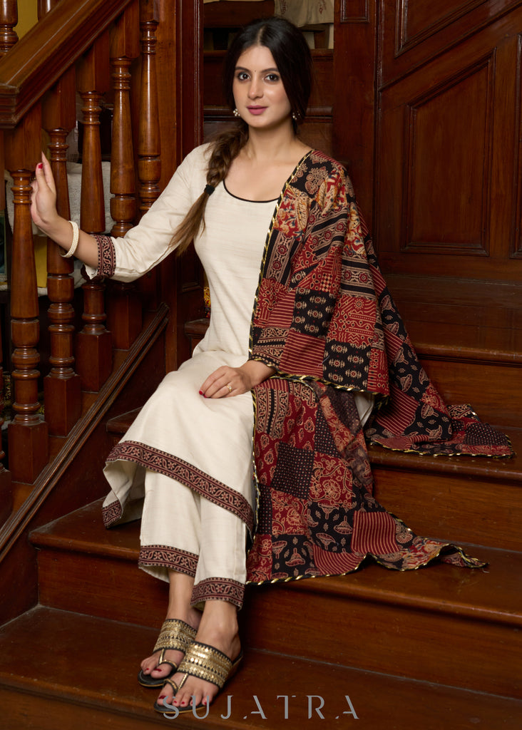 Off-white handloom kurta with contrast ajrakh highlights, paired with complementing pants - Patch work stole Optional