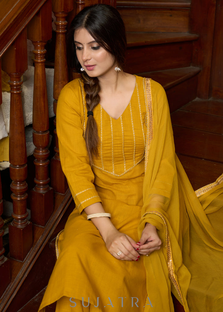 Graceful delicate mustard cotton kurta with a lace yoke and matching pants - Dupatta Optional