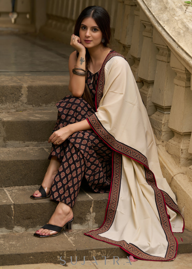 Casual and comfortable black ajrak sleeveless kurta with coordinated pants (Sleeves Provided) - Stole Optional