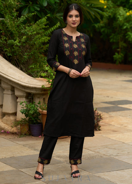 Black embroidered cotton kurta, paired with matching pants - Dupatta Optional