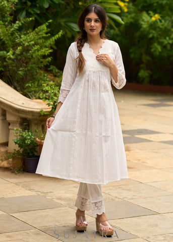 White self-textured lace yoke kurta, paired with matching pants - Dupatta Optional