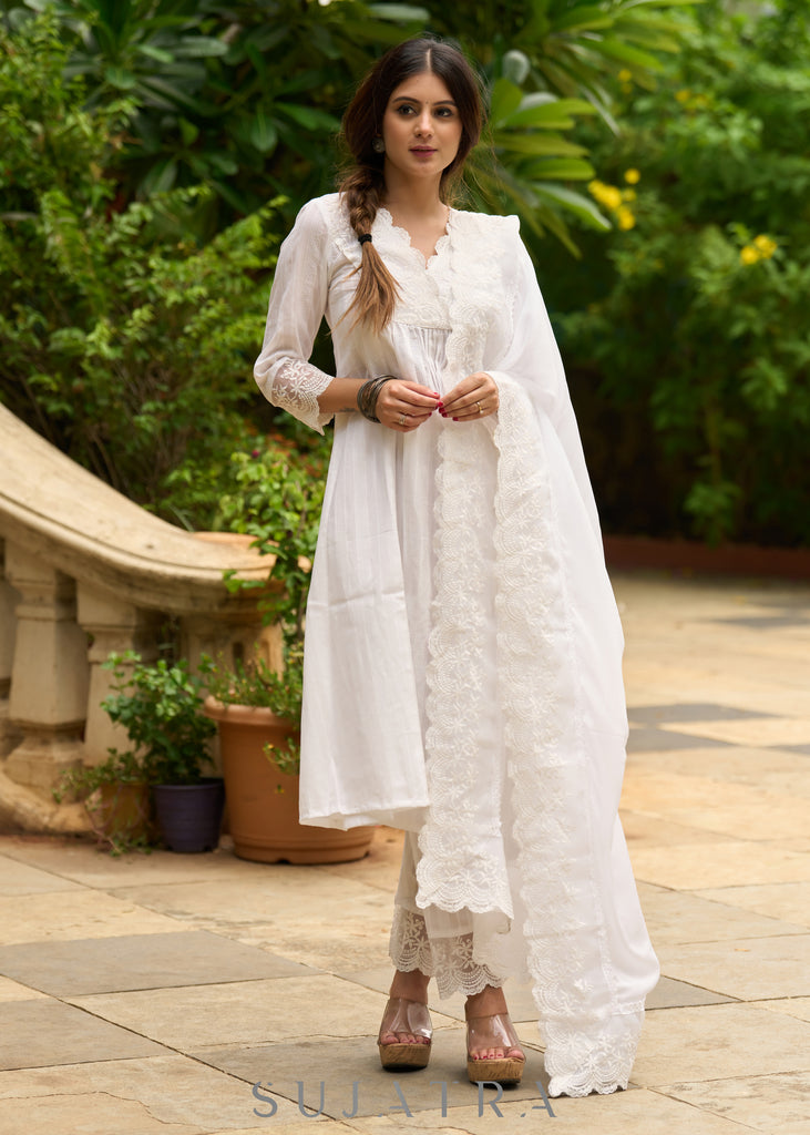 White self-textured lace yoke kurta, paired with matching pants - Dupatta Optional