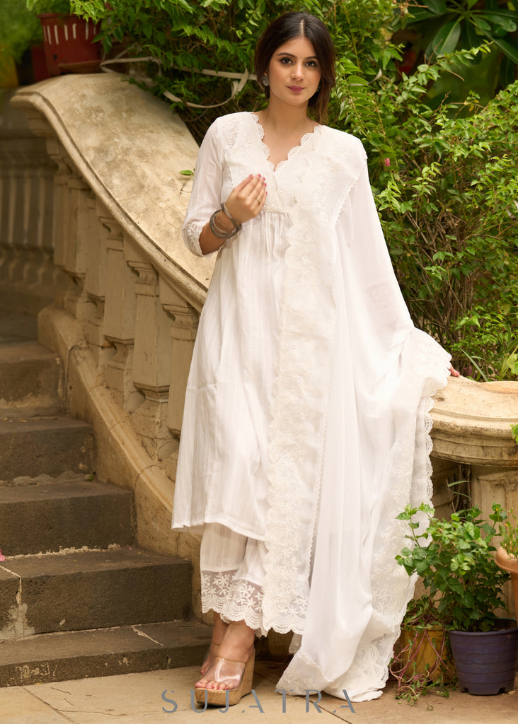 White self-textured lace yoke kurta, paired with matching pants - Dupatta Optional