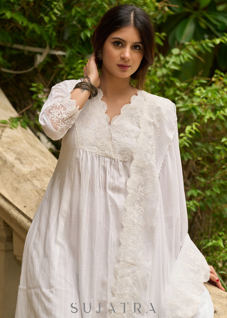 White self-textured lace yoke kurta, paired with matching pants - Dupatta Optional