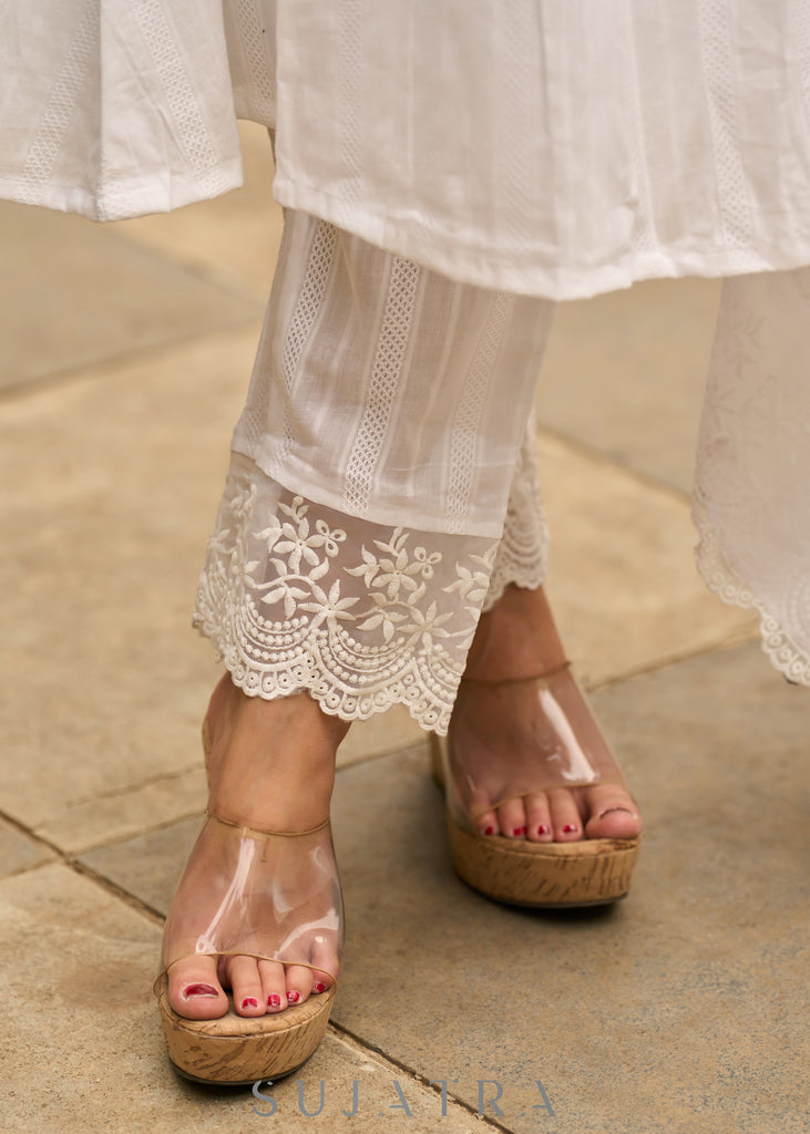 White self-textured lace yoke kurta, paired with matching pants - Dupatta Optional