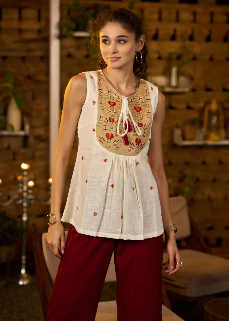 Sleeveless white & beige cotton embroidered top