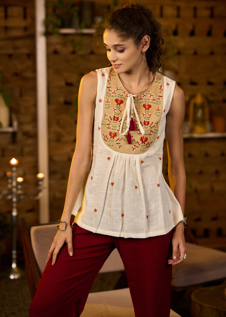 Sleeveless white & beige cotton embroidered top