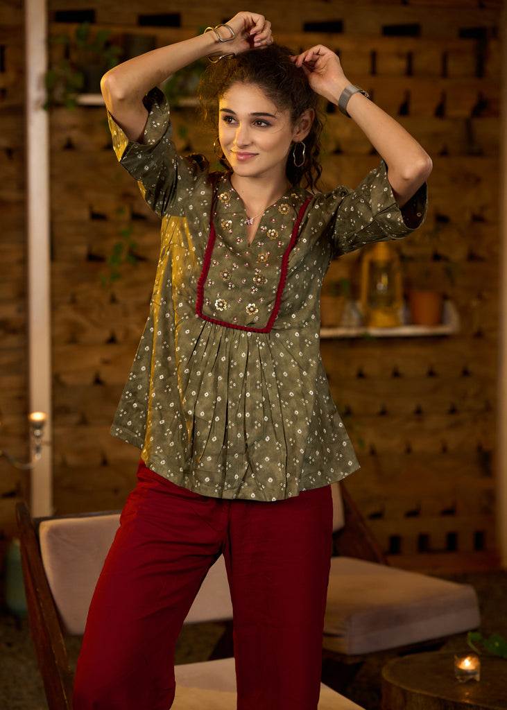 Mehendi green bandhani print top with embroidered yoke