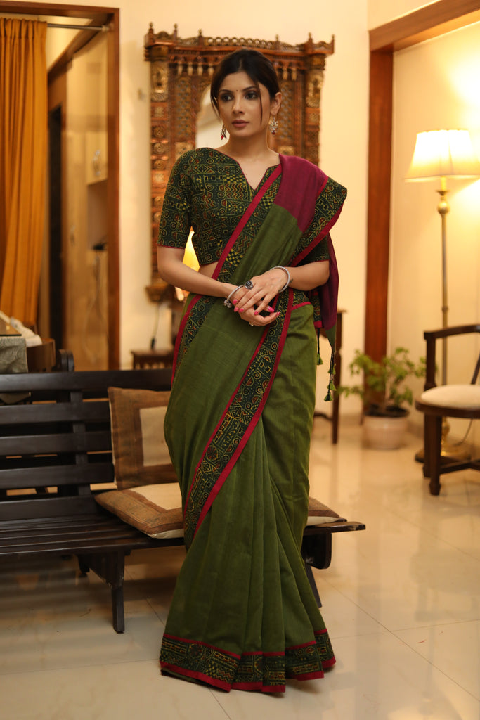 Versatile green and magenta combination Cotton saree with green Ajrakh border