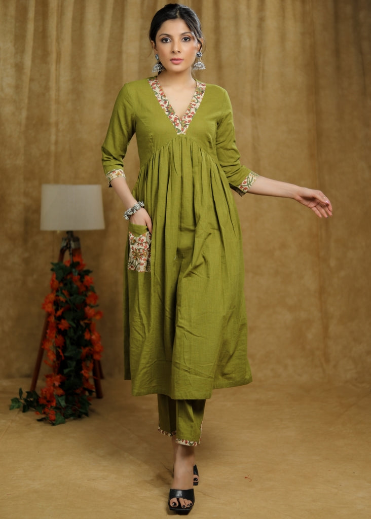 ON-SALE-breezy-mehendi-green-cotton-kurti-with-floral-print-detaling-pocket