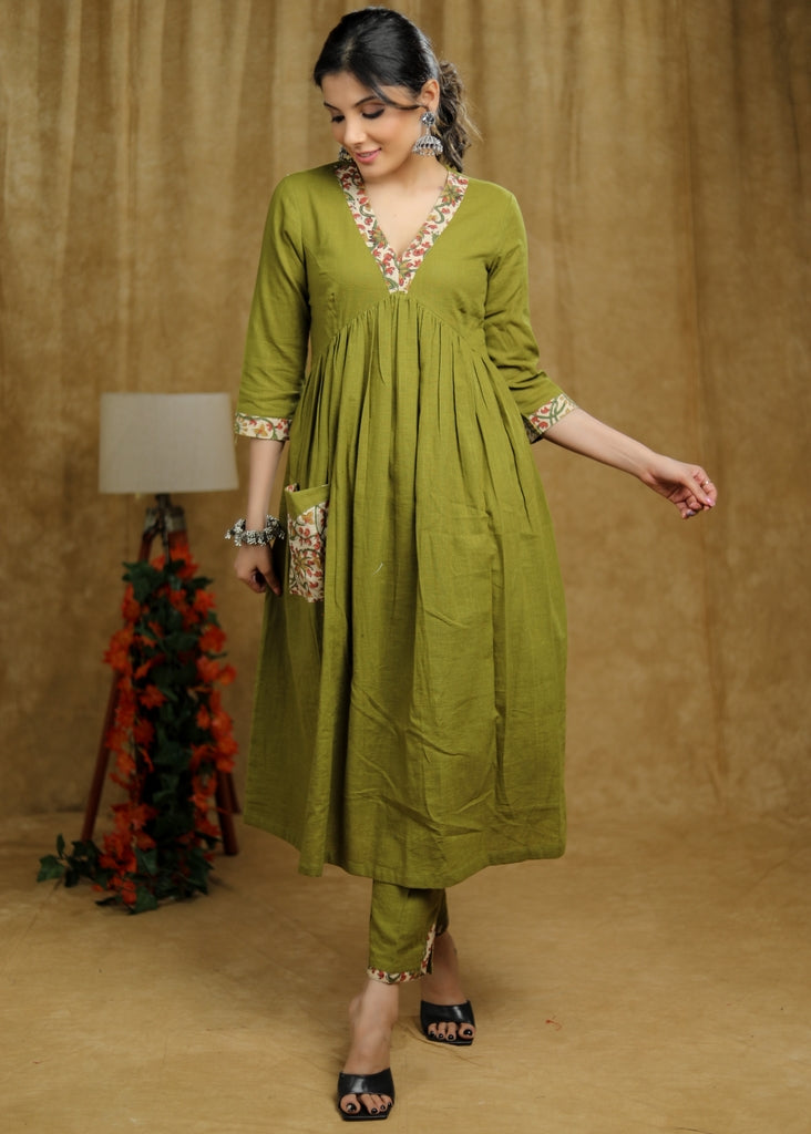 ON-SALE-breezy-mehendi-green-cotton-kurti-with-floral-print-detaling-pocket