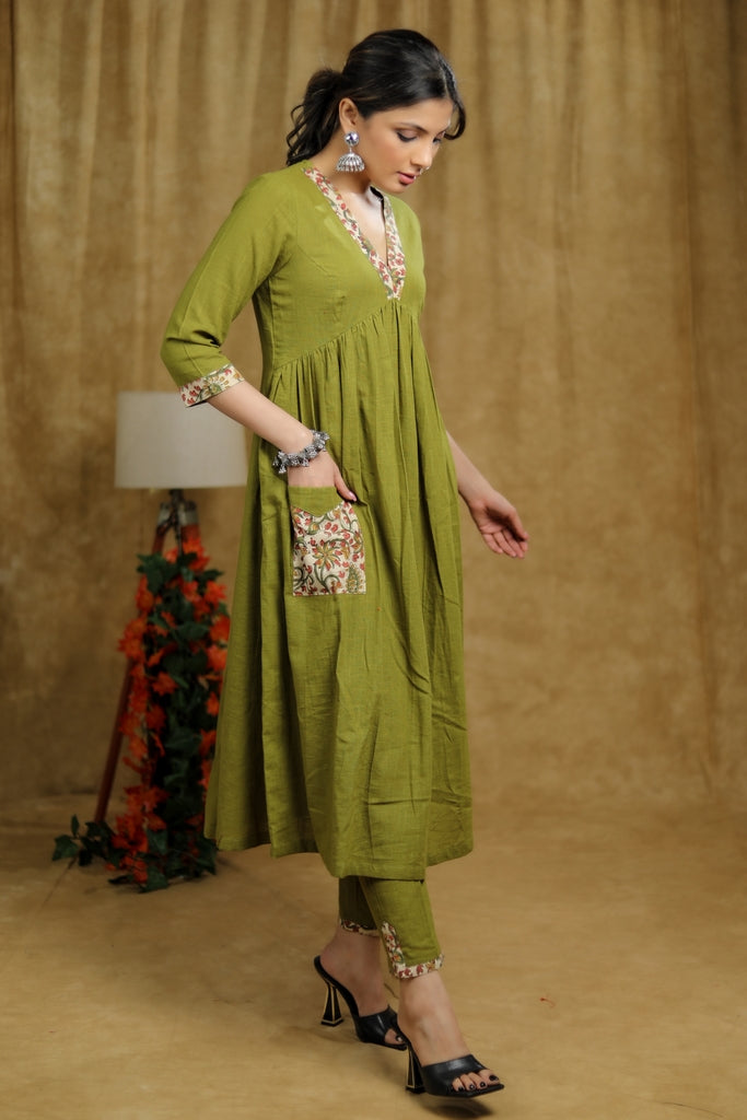 ON-SALE-breezy-mehendi-green-cotton-kurti-with-floral-print-detaling-pocket