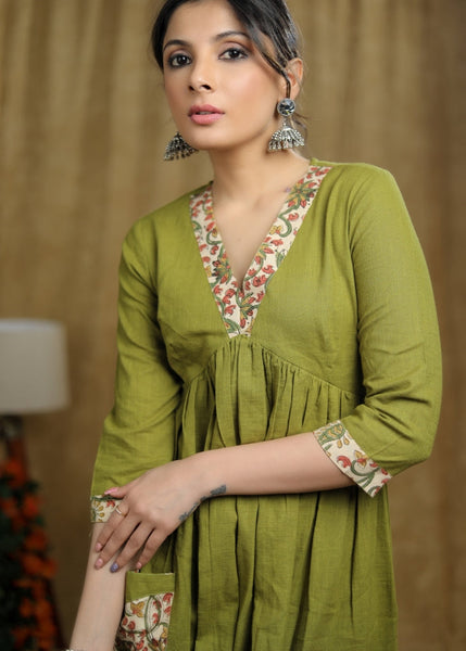 ON-SALE-breezy-mehendi-green-cotton-kurti-with-floral-print-detaling-pocket