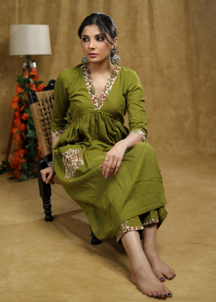 ON-SALE-breezy-mehendi-green-cotton-kurti-with-floral-print-detaling-pocket