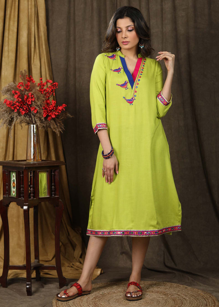 Stylish parrot green tunic dress with sparrow embroidery on yoke highlighted with elegant multicolor lace