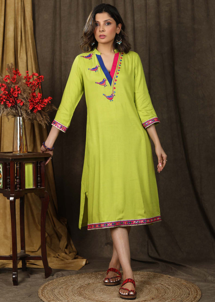 Stylish parrot green tunic dress with sparrow embroidery on yoke highlighted with elegant multicolor lace