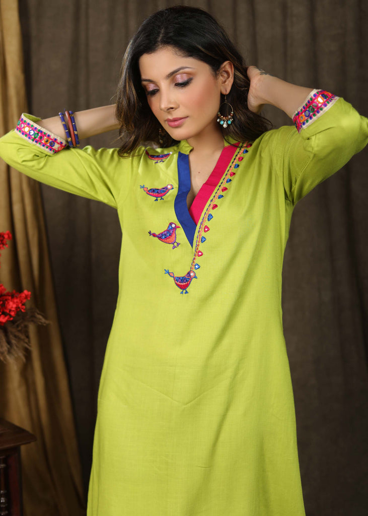 Stylish parrot green tunic dress with sparrow embroidery on yoke highlighted with elegant multicolor lace