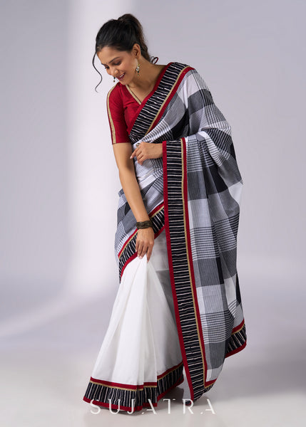 Classy white cotton saree with bold checks & red-black borders