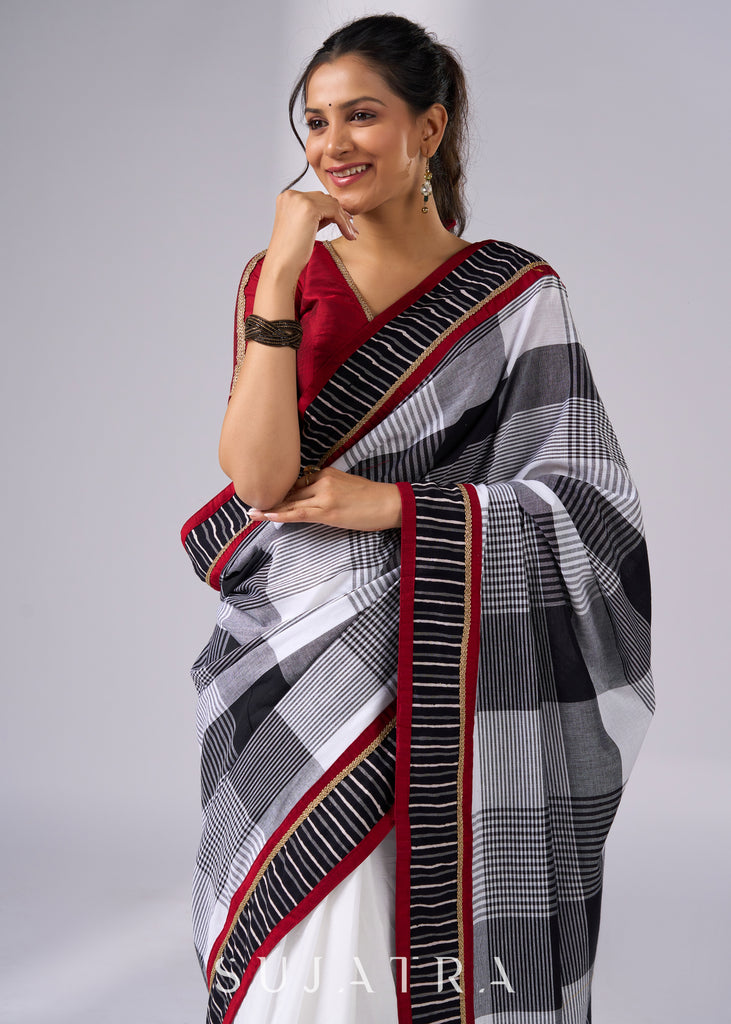 Classy white cotton saree with bold checks & red-black borders