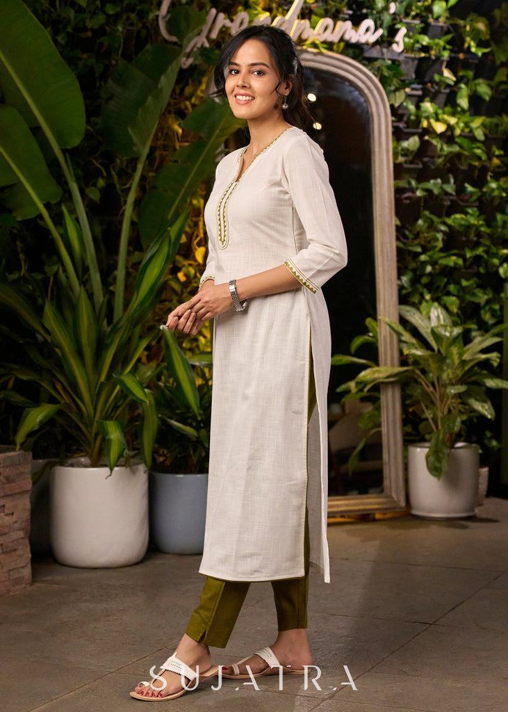 Elegant White Kurta with Embroidery on The Neckline with Contrasting Pant - Stole Optional